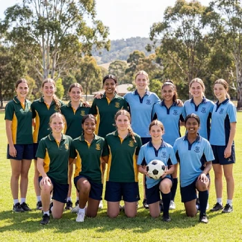 Junior sports team standing together on the field